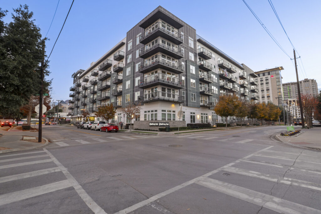 Leasing office entrance, tall glass doors and window