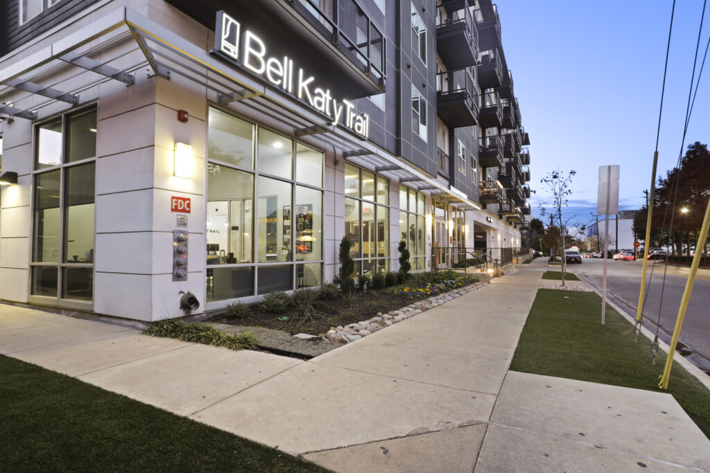 Leasing office entrance, tall glass doors and window