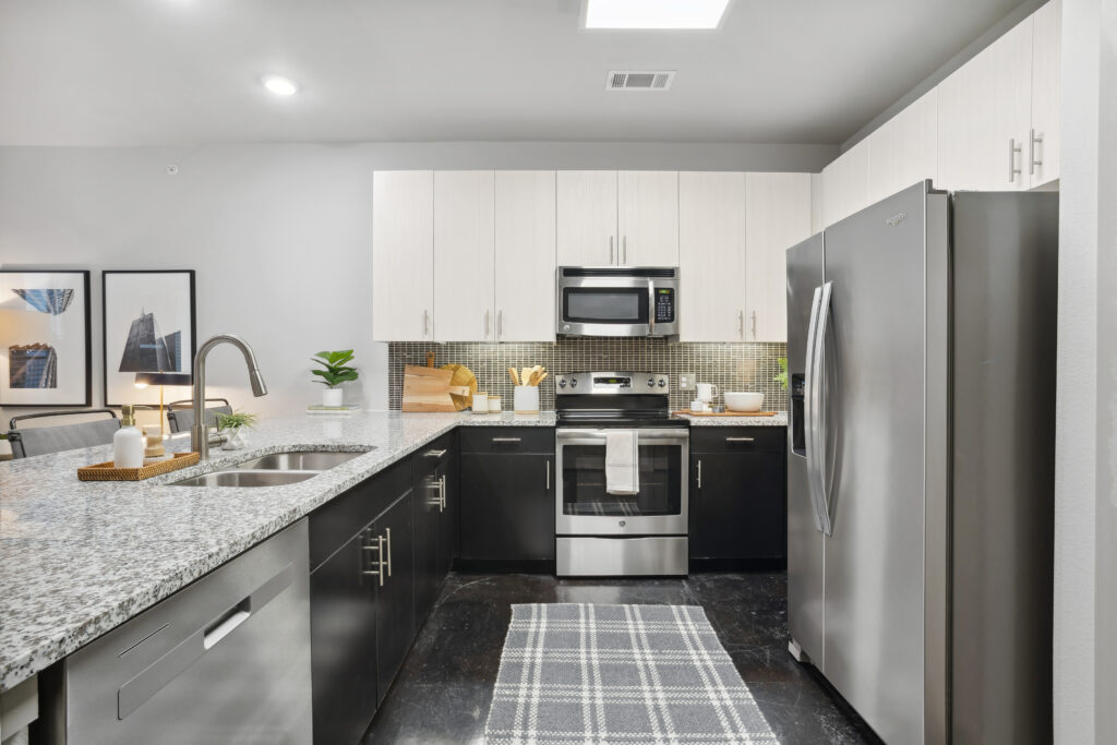 Kitchen with stainless steel appliances and granite counter tops