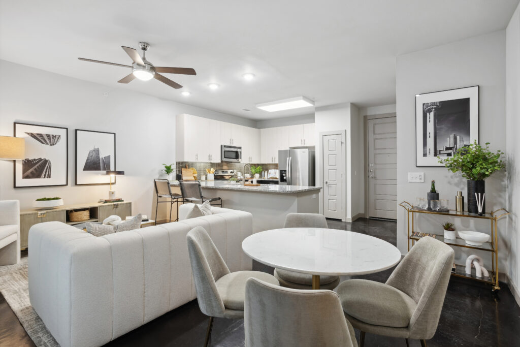 Open concept living and dining room with view into kitchen
