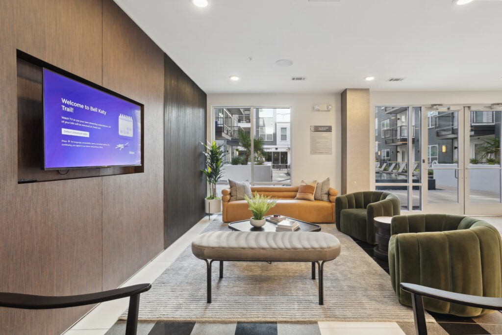 Clubhouse lounge with sofas and TV